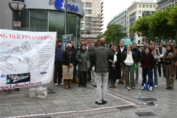 68. LYM chorus in an outdoor mall, from behind the conductor